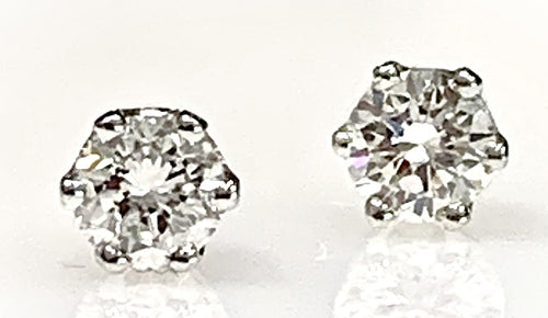 A Pair of 14 Karat Yellow Gold Estate Diamond Stud Earrings