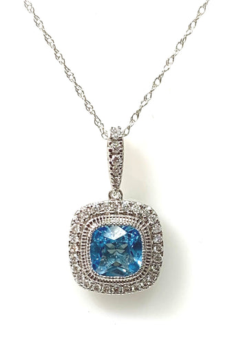 14 Karat White Gold Blue Topaz and Diamond Fashion Pendant