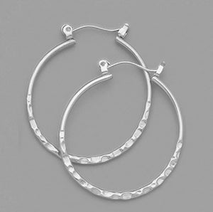 APpair of White Tone Large Round Hammered Hoop Earrings
