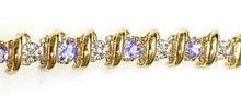 Estate 14 Karat Yellow Gold Diamond and Tanzanite Tennis Bracelet