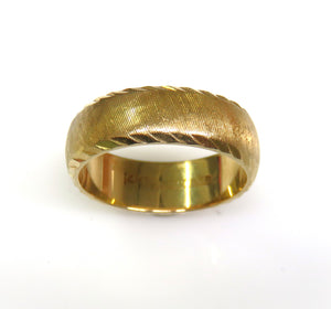 14 Karat Yellow Gold  Estate Diamond Cut Wedding Band with a Florentine Finish