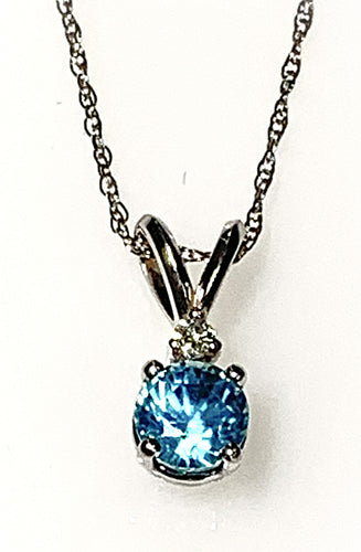 14 Karat White Gold Blue Zircon and Diamond Fashion Pendant