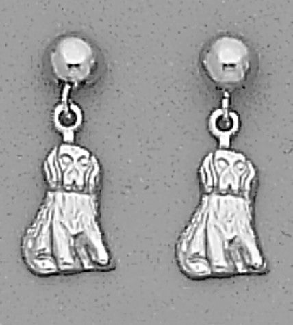 A Pair of White Tone Dangle Dog Earrings