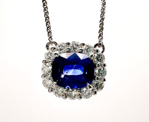 18 Karat White Gold Diamond And Blue Sapphire Necklace